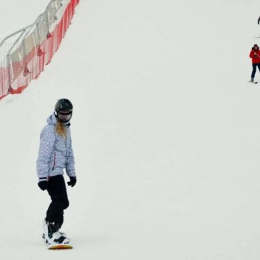 In Silichi Ski resort on a snowboard