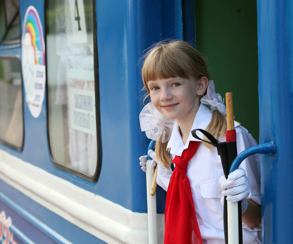 Children's Railway station Belarus, girl with a tie