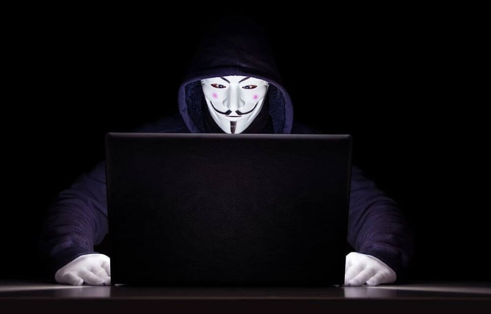 anonymous hacker trying to use  your personal data for data breach, cybersecurity threat