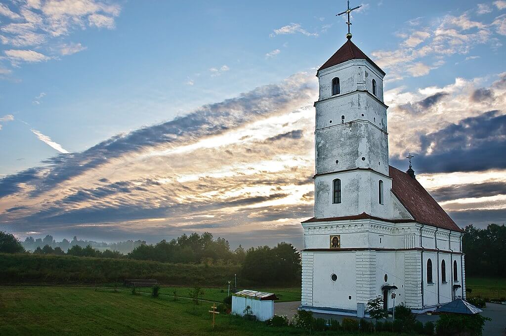 Old church in Zaslavl surrounded by nature