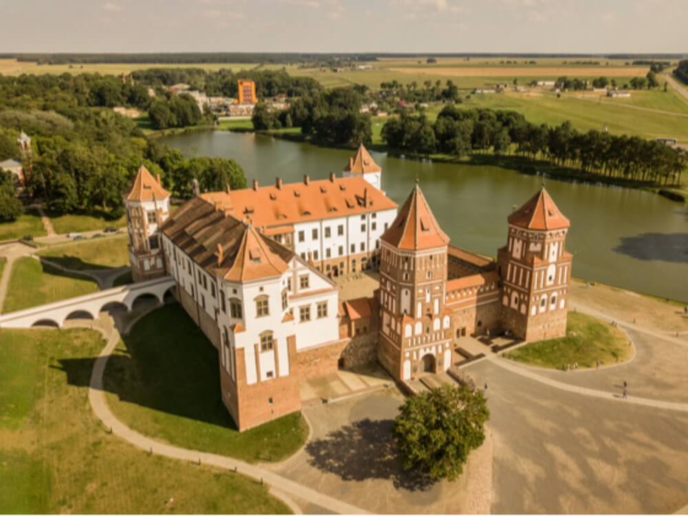 Mir castle and surrounding fields in summer, Belarus historical sights